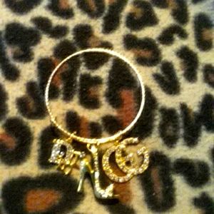 Designer goldtone charm bracelet